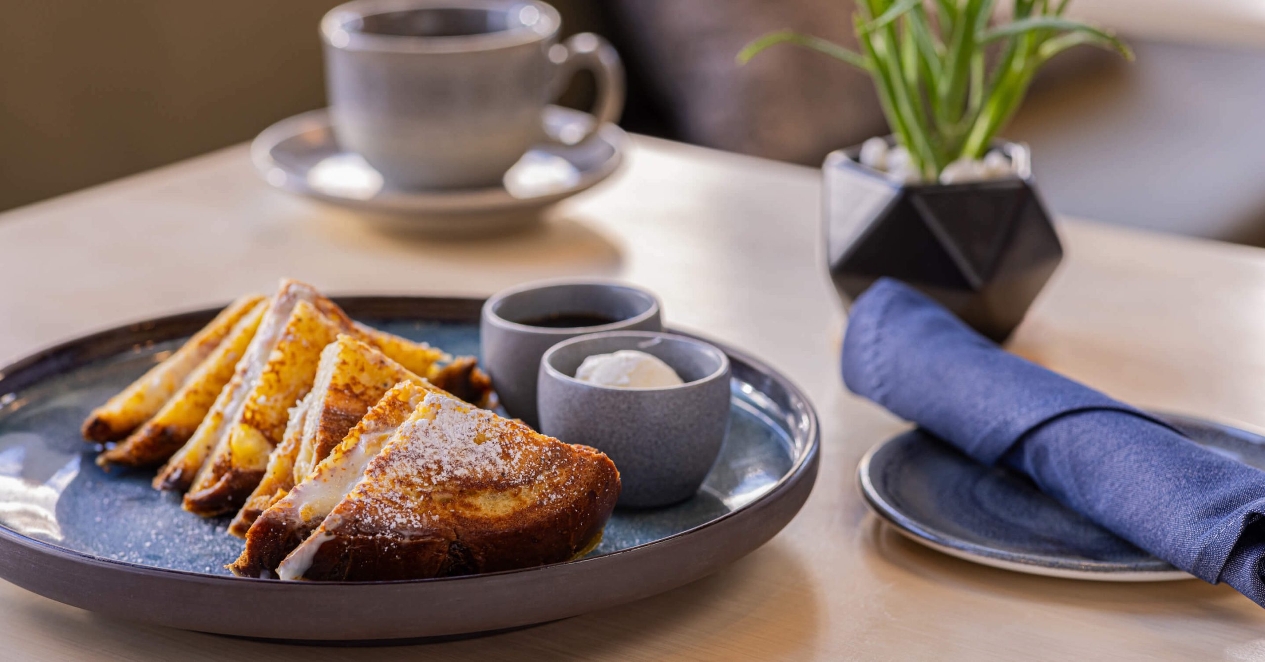 stuffed french toast with a hot cofffee