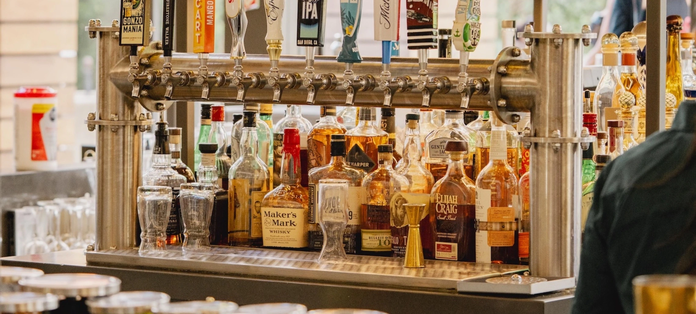 A close view of a stocked bar at the Peel