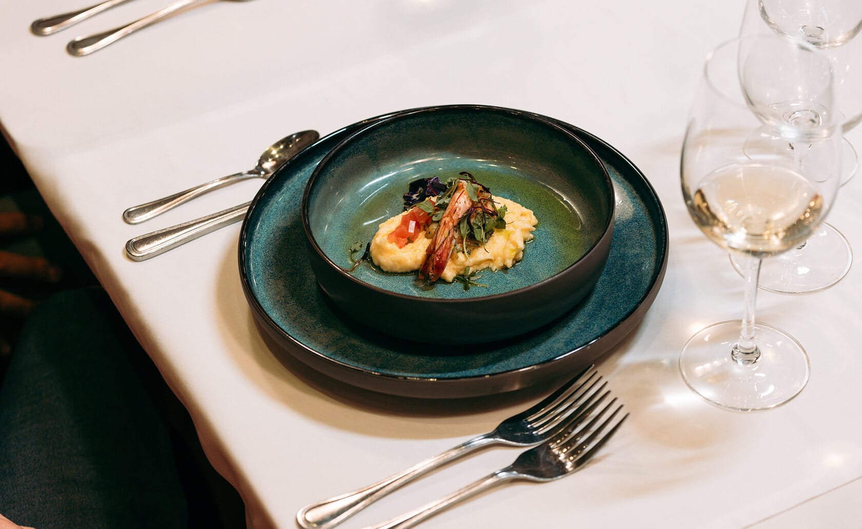A dinner entree on a green plate