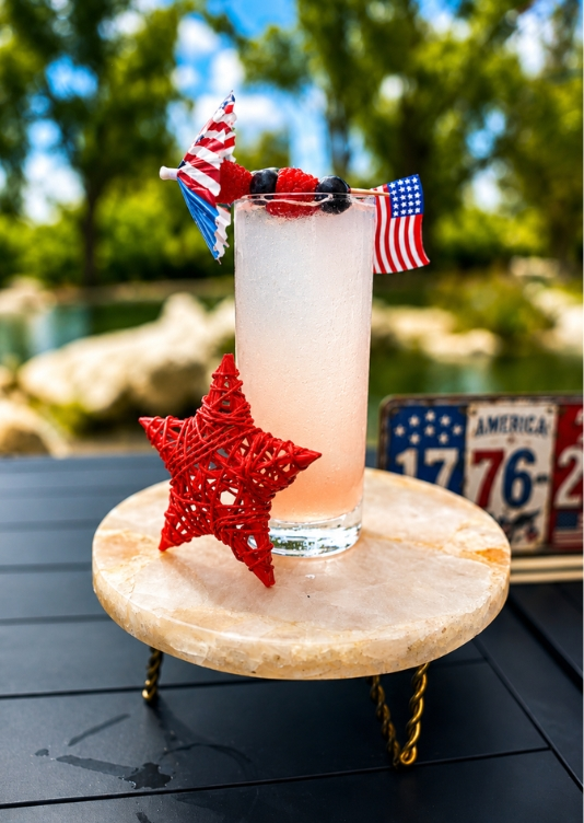 The Peel's America's 250 cocktail with patriotic decorations