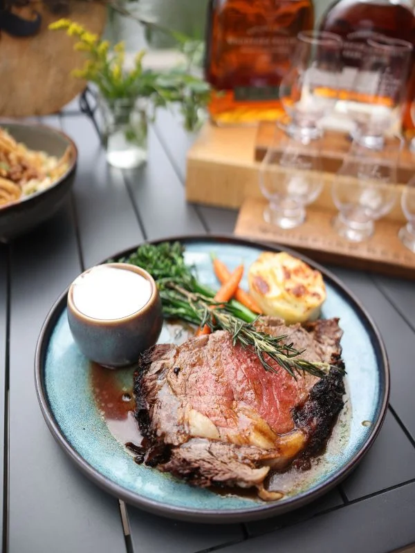 A piece of stake plated with vegetables